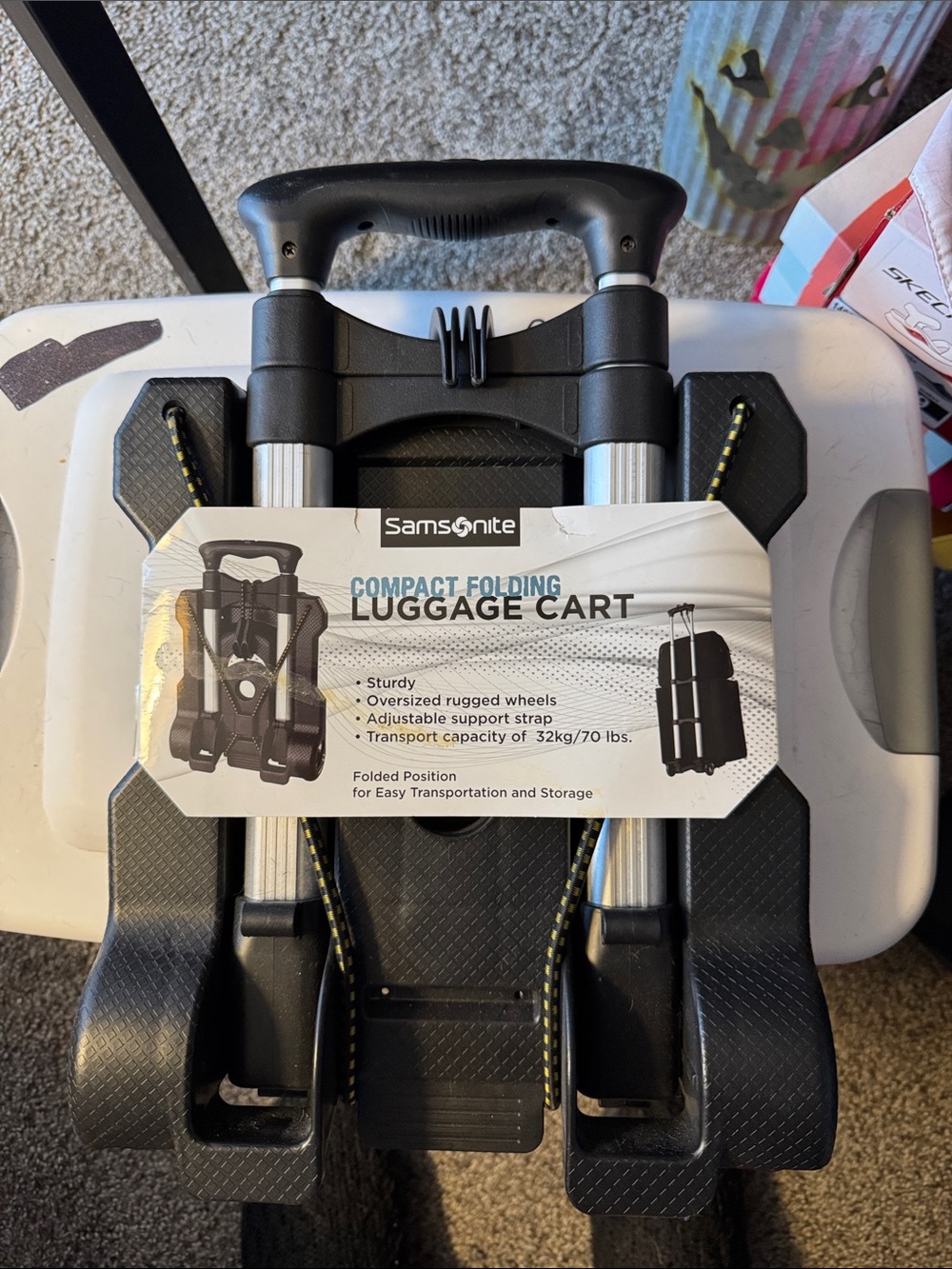 Samsonite Black Compact Folding Luggage Cart with Yellow-Accent Strap